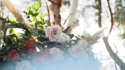 Closeup View of Wedding Arch Decorations of Flowers in Pastel Faded Colors Slow Motion Outside