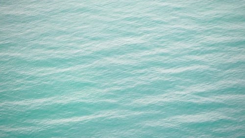 Abstract Aerial Sea Summer Ocean Sunset Nature Background Small Waves on Water Surface in Motion