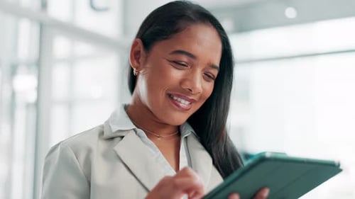 Laughing, reading and woman with tablet in office, research and social media for planning