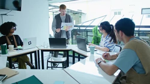 Business Team Meeting in Modern Office
