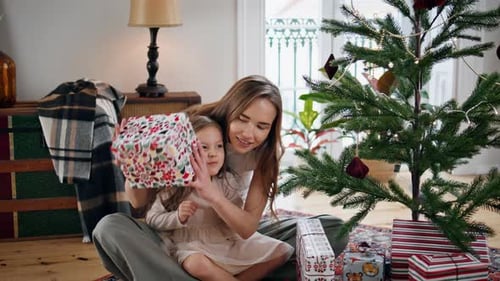 Mother and Child Celebrate Christmas at Home