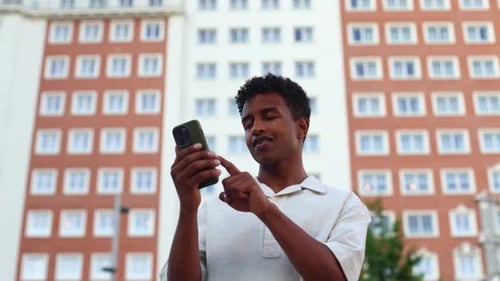 Man Using Smartphone in the City