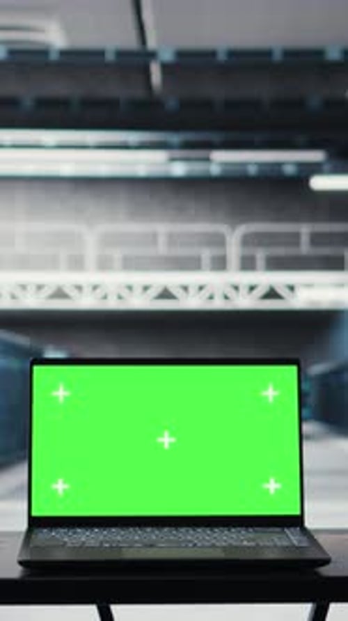 Vertical Video Green Screen Laptop in High Tech Data Center Facility