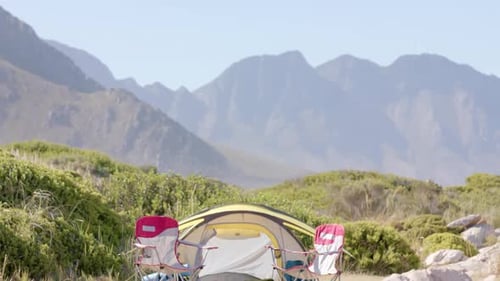 Camping Tent and Chairs with Mountain View