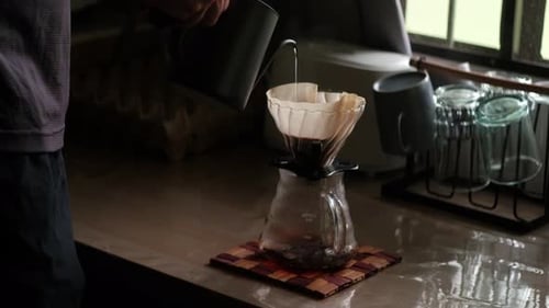 Close-Up Static Shot of Pour-Over Coffee Brewing Indoors