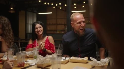 Mixed Race Spouses In Friends Party In Restaurant Young Indian Woman And Caucasian Man