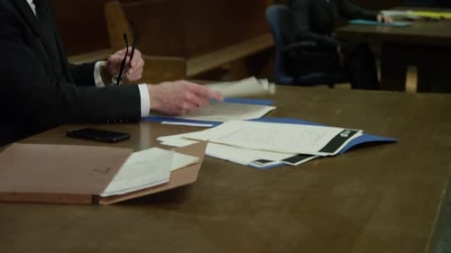 Lawyers in court - tilt up to reveal legal scene