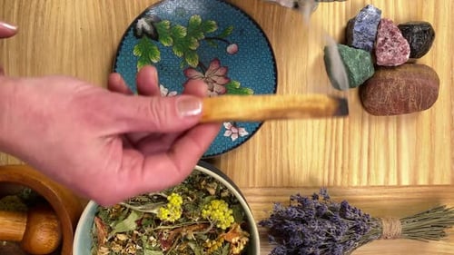 Table Top View Female Hand Stick Sacred Palo Santo Smoldering Wood