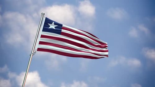 Liberia Flag Waving in the Wind with Blue Sky Background