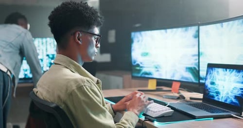 Computer screen, developer and coding on keyboard in office and productivity on futuristic