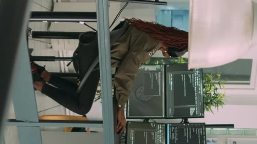 Vertical Video Software Developer Typing Programming Code on Computer Keyboard
