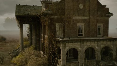 Abandoned Haunted Mansion on a Misty Overcast Day