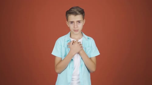 Teen Boy Expressing Chest Pain or Anxiety