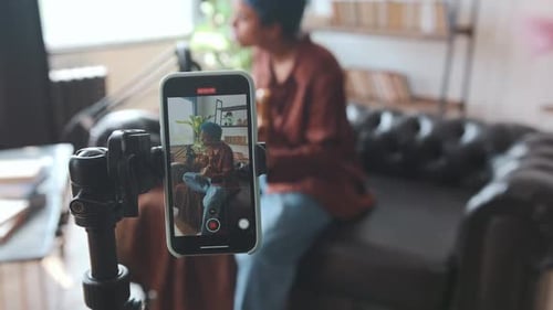 Smartphone Recording Guitar Player Indoors
