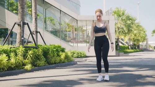 Young Woman Athlete Doing Exercise Sport Yoga in City Showing Healthy Lifestyle Fitness Training
