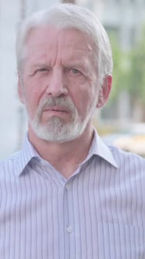 Close-Up of Senior Man With Gray Hair and Beard