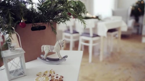 Festive Christmas Decorations with Evergreen and Toy Horse