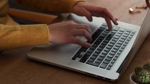 Close up Business woman hand typing on laptop keyboard.