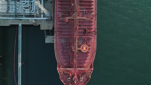 Aerial Top Down View of a Tanker is Loading in Oil Berth Harbour Terminal