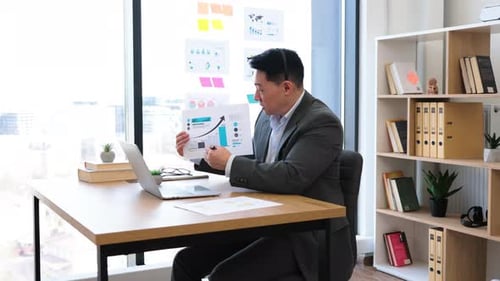 Professional Explains Business Graph During Video Call