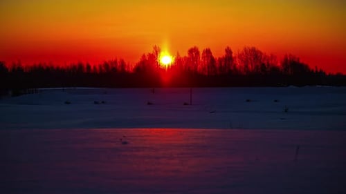 Colorful timelapse illuminating the winters landscape with bright sunlight.