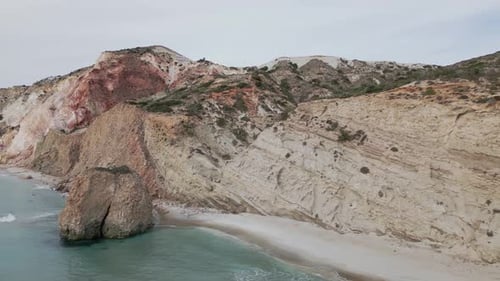 Aerial view of the beach and cliffs, Milos, Greece.