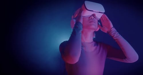 Person Immersed in Virtual Reality Headset