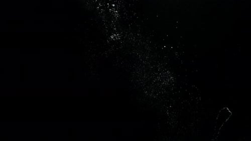 Submerge Collection: Three big bubble rings falling back to back from the top on a black background