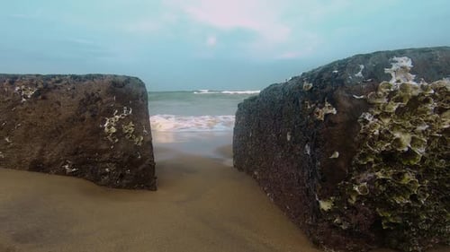 Looking at sea between rocks