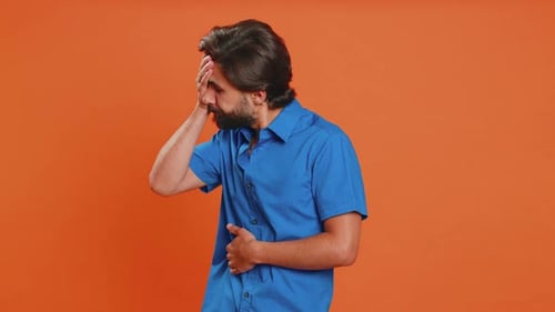 Young Man Making Face Palm Gesture Feeling Bored Disappointed in Result Bad News Sorrowful