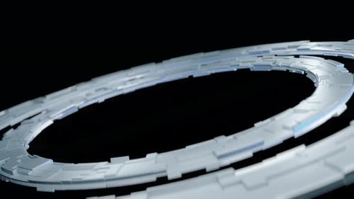 Bagues technologiques brillantes futuristes avec motif géométrique abstrait sur fond noir
