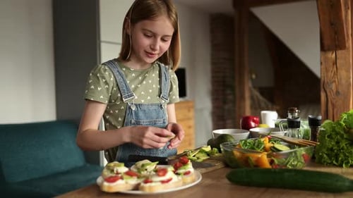 Young Girl Making Delicious Healthy Snacks in Kitchen