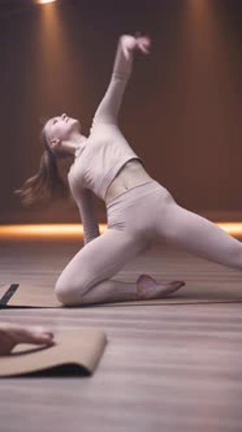 Young Woman Practicing Yoga Indoors
