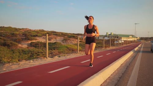 Woman Run on Roadside Running Track Summer Day