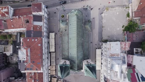 Aerial top view: Sacred Heart Cathedral, surrounded by Sarajevo's urban structures
