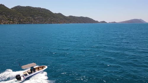 Beautiful view of the beach with boats, pure nature, sea and ships. Shot from a drone.
