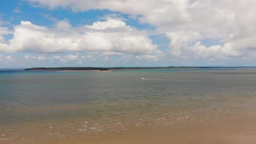 Aerial View of Serene Beach and Coastal Waters