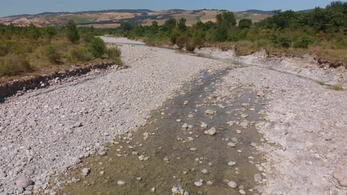 Aerial flight over river that is drying up in Europe.