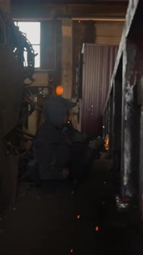 Fire Sparks Fly at Welding of Metal Construction at Plant