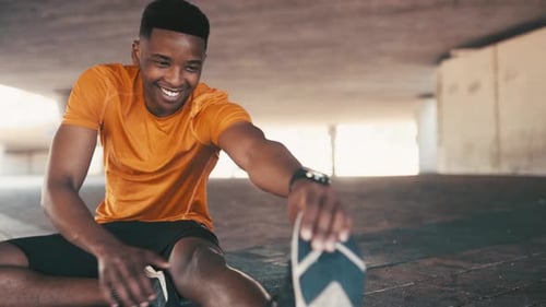 Smiling Athlete Stretching in Urban Setting