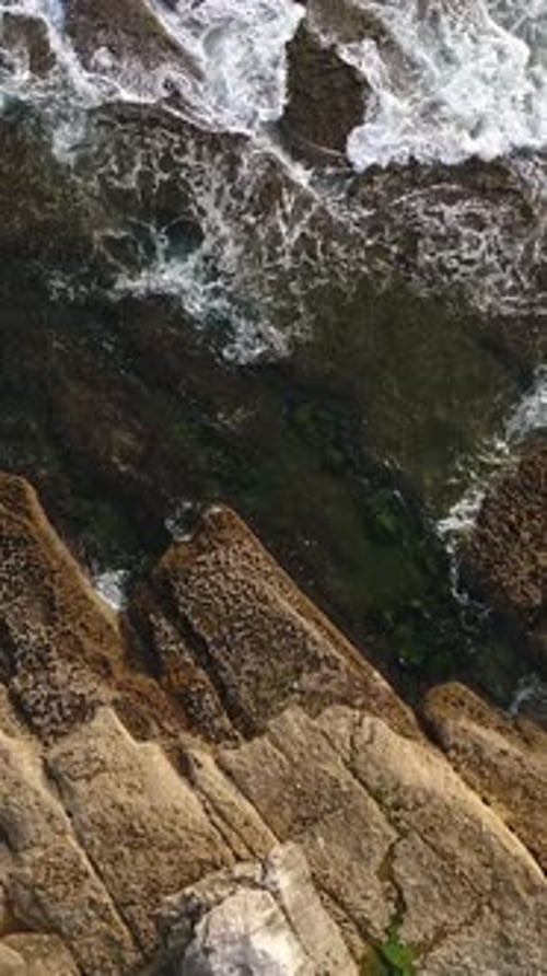 Vertical Video of Sea Waves and Rocks