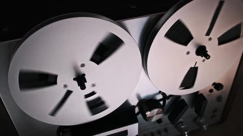 Reel-to-Reel Tape Deck Spinning Quickly