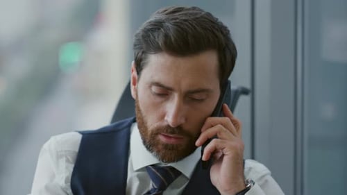 Serious Boss Answering Phone Call Sitting Modern Company Office Close Up. Portrait Of Middle-Aged...