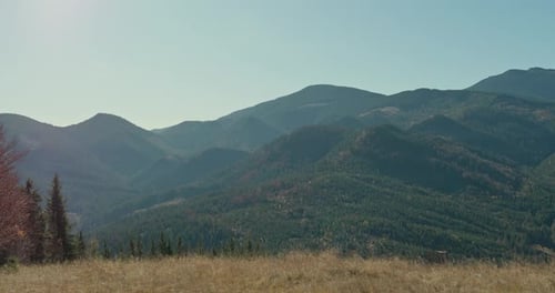 Hilly Terrain with Green Mountains in Sunny Day