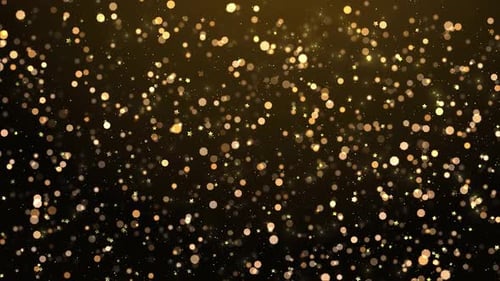 Glittering golden particles motion background. Abstract background with magic lights and sparks. Sea