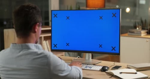 Mockup screen, computer and man in office working online for website, research