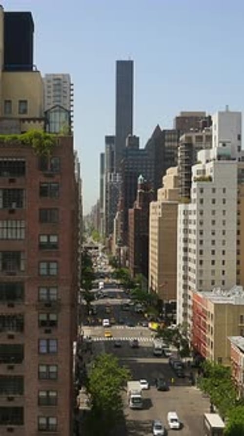 Vertical Video of Modern Urban City High Rise Buildings Real Estate