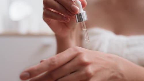 Moisturizer, Woman Leisurely Doing Skin Massage In Spa Salon Camera In Motion Young Girl