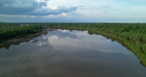 Flying Over the River in Cloudy Weather