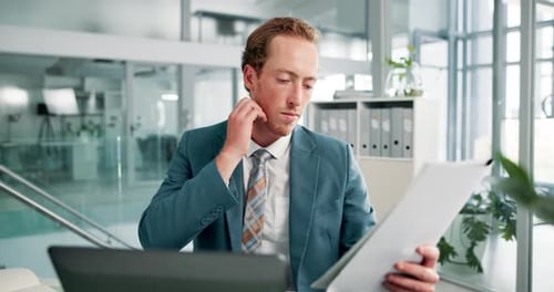 Documents, laptop and review with business man at desk in office for administration or research